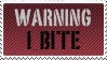 A stamp with the text 'Warning I bite'