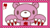 A stamp of Gloomy Bear with his paws towards the screen and a little dripping red heart in the top left corner