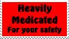 A stamp that flashes different colours with the text 'Heavily medicated for your safety'